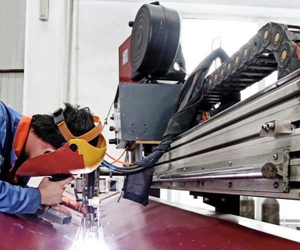 Welding workshop for stainless steel machine chassis